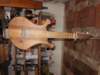 mydaughterrebekasmandolinsizedguitar_small.jpg